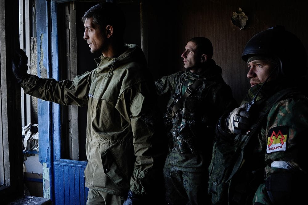 Donetsk, Ukraine. October 4th, 2014. A pro-Russian commander using the name of ‘‘Givi’’ (right) and his unit, direct artillery fire on the airport in Donetsk from a high-rise building half a kilometer away. For more than a week, Pro-Russian fighters have been attacking Ukrainian forces in an effort to regain the control over the Donetsk airport.