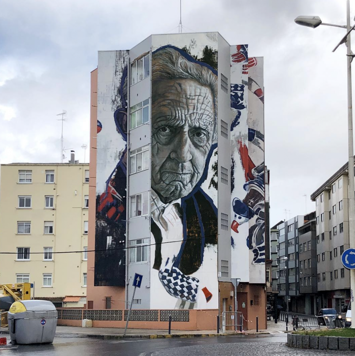 portrait énorme sur une barre d'immeuble par la street artiste Lula Goce
