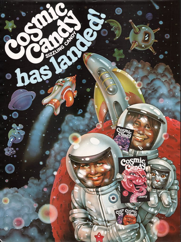 Affiche pour les bonbons Cosmic Candy avec des astronautes tenant les paquets de bonbon. 