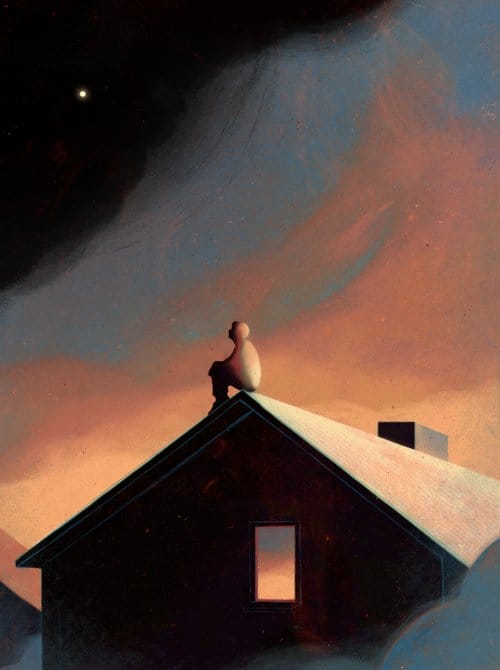 Homme regardant le ciel sur le toit d'une maison.