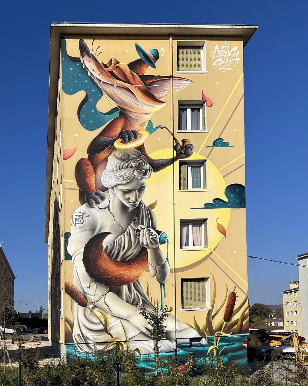 Peinture murale d'un renard portant un ange par les graffeurs Abys et Scaf