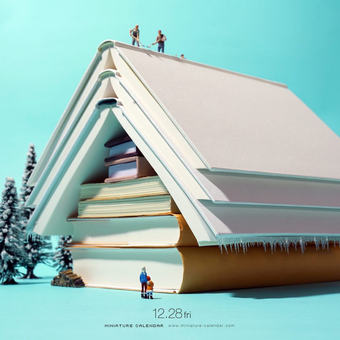 Ce diorama représente un chalet créé avec des livres. par Tatsuya Tanaka