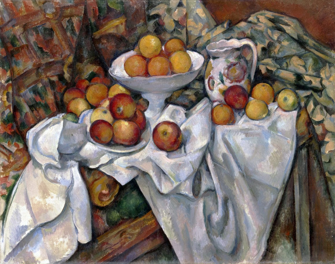 Tableau de Cézanne où l'on voit des dizaines de pommes et d'oranges sur une nappe blanche