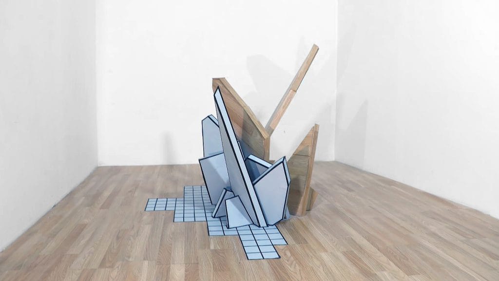 Sculpture éclatée entre bois et lignes graphiques. © Bastien Cuénot
