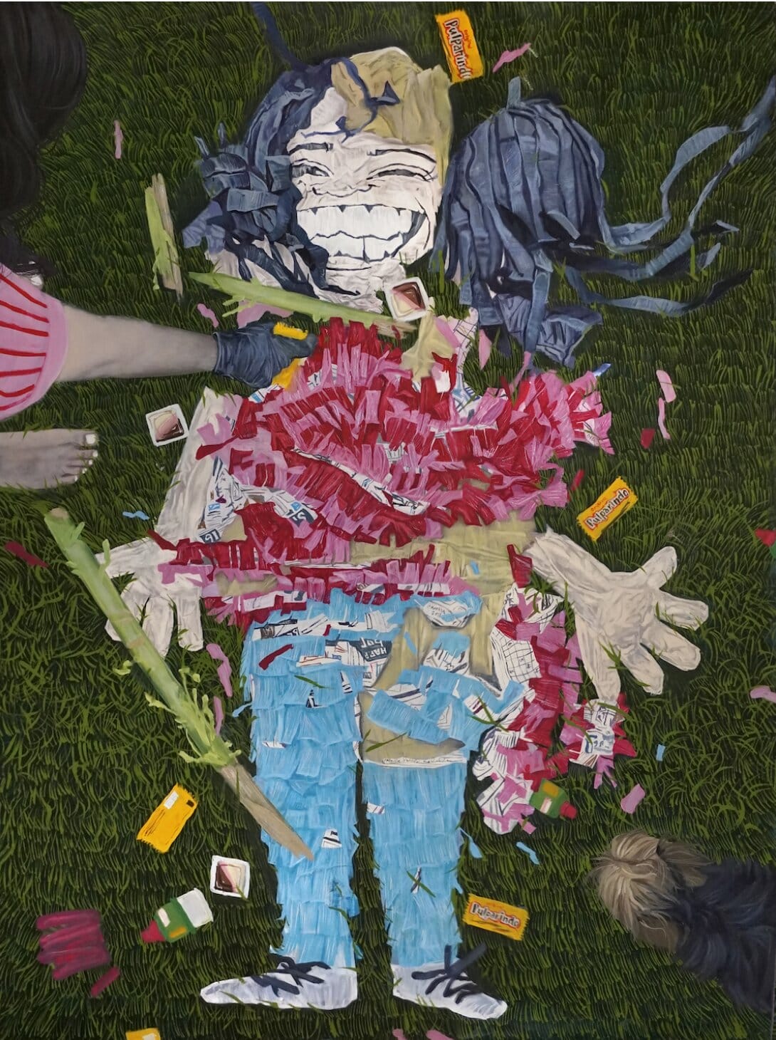 La piñata cassée dans l'herbe