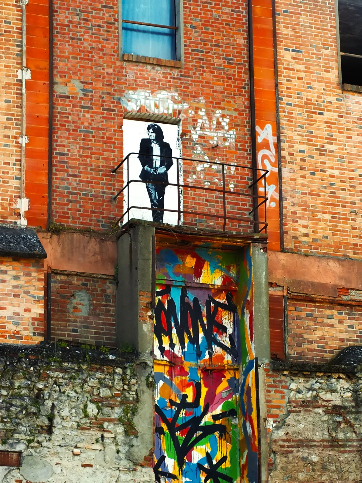 Œuvre de Jef Aérosol sur le mur de la vinaigrerie