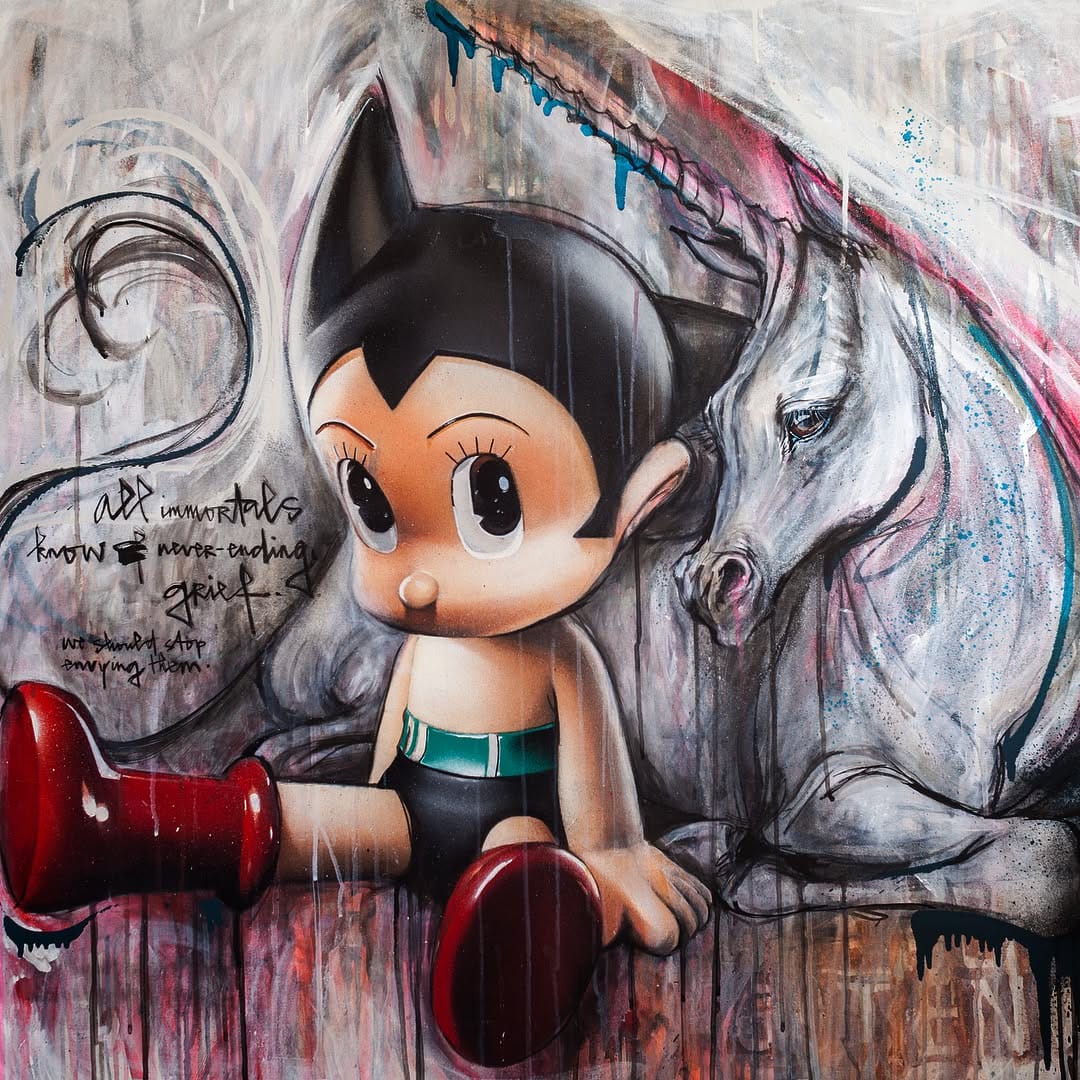 Fresque réaliser par le duo Herakut. On y voit Astroboy l'air inanimé et avachi, le dos posé sur une licorne qui le regarde l'air triste.